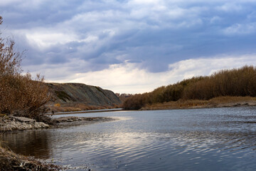 The Ishim River is a riverbed, an autumn landscape.