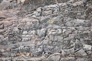 Rock layers - a colorful formations of rocks stacked over the hundreds of years. Interesting background with fascinating texture.