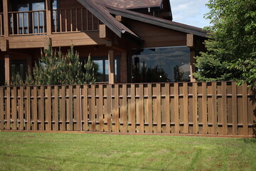 old wooden house with fence