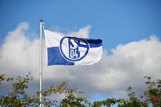 Zeven, Lower Saxyony, Germany - September 11, 2022:  Flag with the Schalke 04 logo - Schalke 04 is a professional German football and multi-sports club