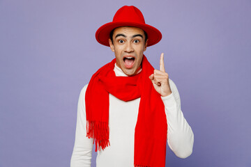 Young insighted smart middle eastern man he wear white turtleneck red hat scarf holding index...