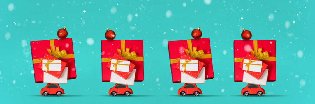 Red cars delivering heaps of Christmas gift boxes, bonus cards under snowfall, blue background