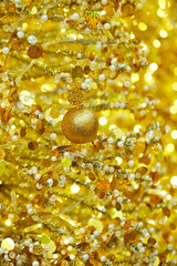 Ball decorations on a yellow Christmas tree