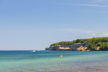 Kayakers on Lake Superior at Pictured Rocks National Lakeshore, Upper Peninsula, Munising Michigan, USA