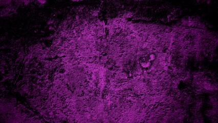 A textured purple concrete wall with a prominent vertical crack. 