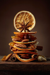 Christmas still-life with dried fruits, nuts, and spices.
