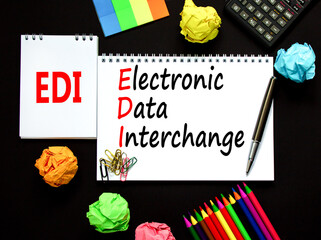 EDI electronic data interchange symbol. Concept words EDI electronic data interchange on white note...