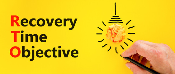 RTO recovery time objective symbol. Concept words RTO recovery time objective on a beautiful yellow...