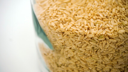 Brown rice - low carbohydrate on an isolated white background