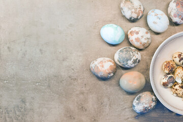 Fototapeta na wymiar blue easter eggs on concrete. Happy Easter card: marble stone effect painted. top view, flat lay