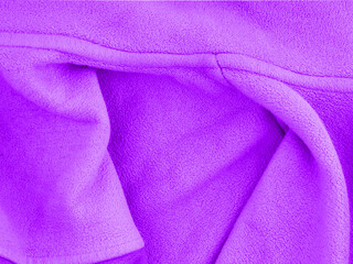 Abstract texture made of purple fabric. Top view