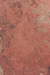 texture of red stone wall - blank copy space background 