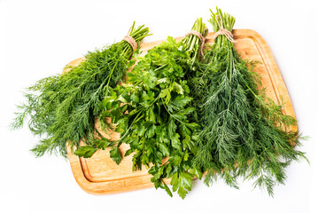 Bunches of fresh dill and parsley. Isolate on a white background