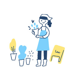 花束を持っている花屋の女性