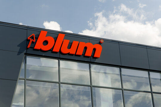 KIROV, Russia - August 2021: BLUM logo on the exhibition hall building on a sunny day.An international company producing accessories for cabinet furniture.
