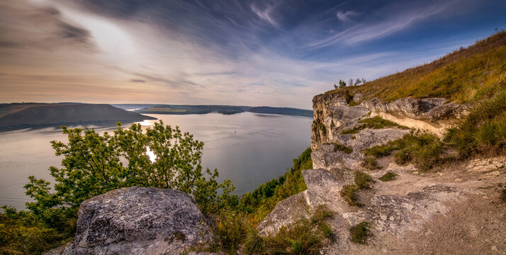 a beautiful view from the bank of Bakota to the Dniester Canyon under the blue sky in the evening