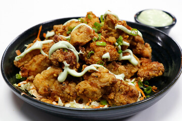 crispy fried chicken bites with white background