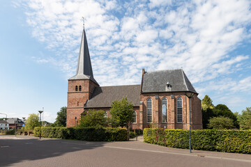 Fototapeta na wymiar Reformed Gothic style church in the center of the rural Dutch village of Groesbeek in Gelderland.