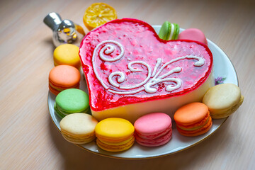 Heart cake for St. Valentine's Day, Mother's Day, or Birthday, decorated with heart sugar on wooden table