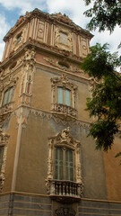 Windows and balconies of a palace and historic building in the city of Valencia (Spain)