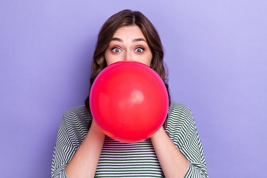 Photo of pretty lovely lady dressed trendy clothes blow air balloon preparing hen party isolated on purple color background