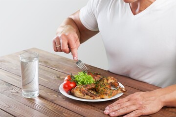 Tasty healthy food with salad on the desk