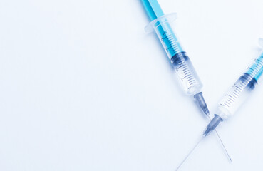 Disposable plastic syringe prepared for injection and vaccination in the hospital. The concept of medicine and health