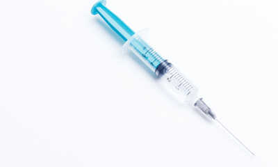 Disposable plastic syringe prepared for injection and vaccination in the hospital. The concept of...