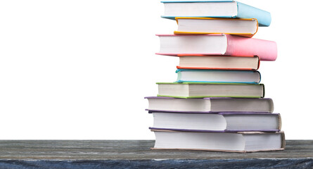 Colorful books stacking on wooden table and stacked books