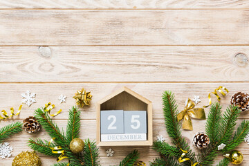 Christmas calendar 25 december. Christmas gift, fir branches, pine cones. Flat lay, top view. New...