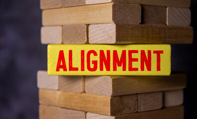 alignment on wooden block and various business papers on brown background - obrazy, fototapety, plakaty