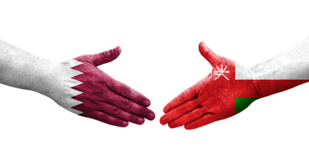 Handshake between Oman and Qatar flags painted on hands, isolated transparent image.