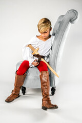 Youth Child Boy Kid Cosplaying Prince Sitting in Chair