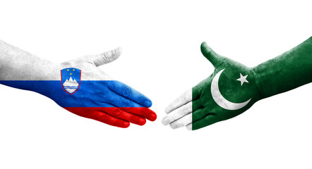 Handshake between Pakistan and Slovenia flags painted on hands, isolated transparent image.