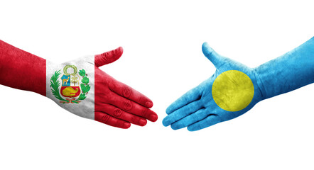 Handshake between Palau and Peru flags painted on hands, isolated transparent image.