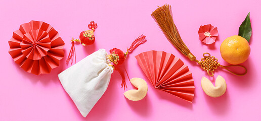 Chinese symbols on pink background. New Year celebration