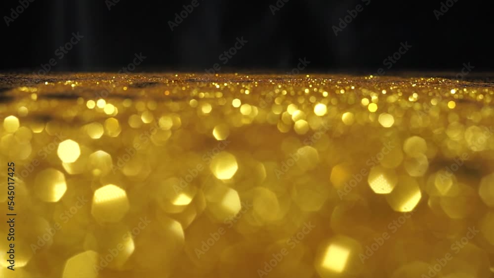 Poster Abstract golden texture in blurry light for background animation. Glitter pattern for video effect, transition and overlay
