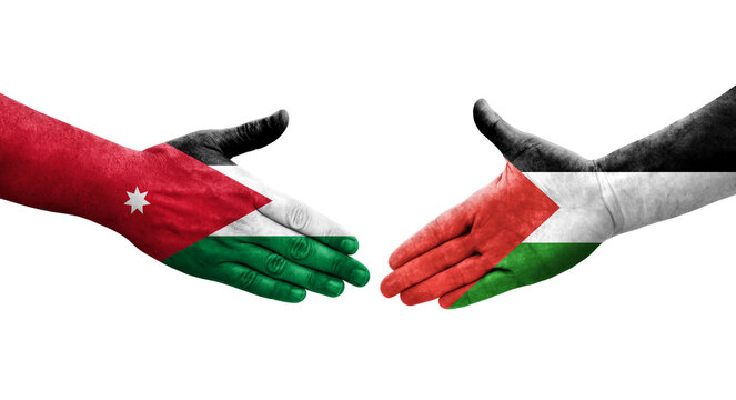 Handshake between Palestine and Jordan flags painted on hands, isolated transparent image.