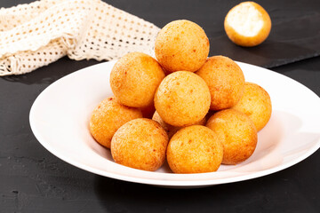 Tasty Buñuelos Traditional Colombian Food; Fried Cheese Flour Dumplings