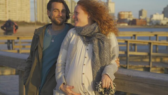 4K 30FPS Sweet Pregnant Couple Standing On Pier in Uruguay In The Sun
