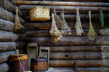 Medicinal herbs are dried in the interior of the summer kitchen of a wooden house built in 1912 in...