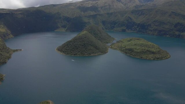 Cuicocha Lake, big lake around mountains, aerial shot of lake and volcano