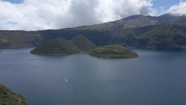 Cuicocha Lake, big lake around mountains, aerial shot of lake and volcano