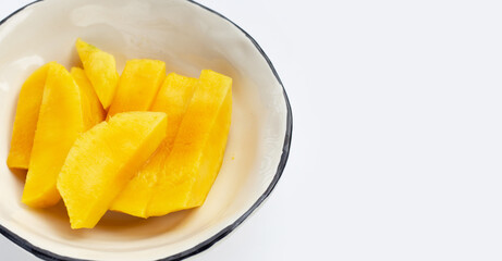 Fototapeta na wymiar Yellow mango slices on white background.