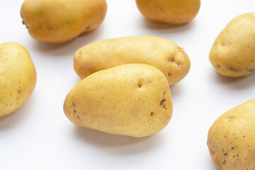 Raw potatoes isolated on white background