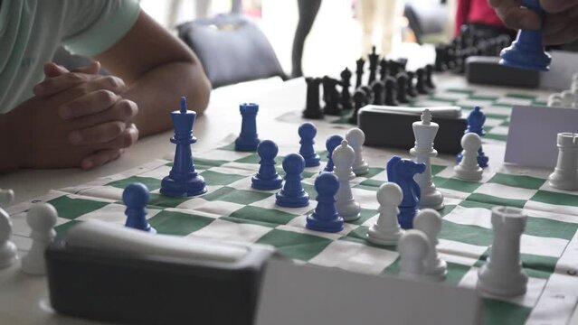 Close up in chess tournament of young players