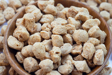 Textured soy protein on white background.