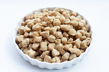 Textured soy protein on white background.