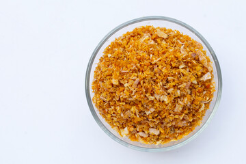 Dried chopped garlic on white