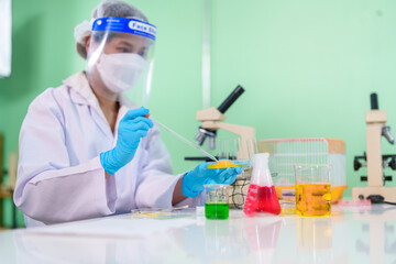 Modern Medical Research Laboratory: Stem cell researcher working in laboratory Study on Stem Cells on the Stereo microscope view in laboratory , Advanced Scientific Lab for Medicine, Biotechnology.